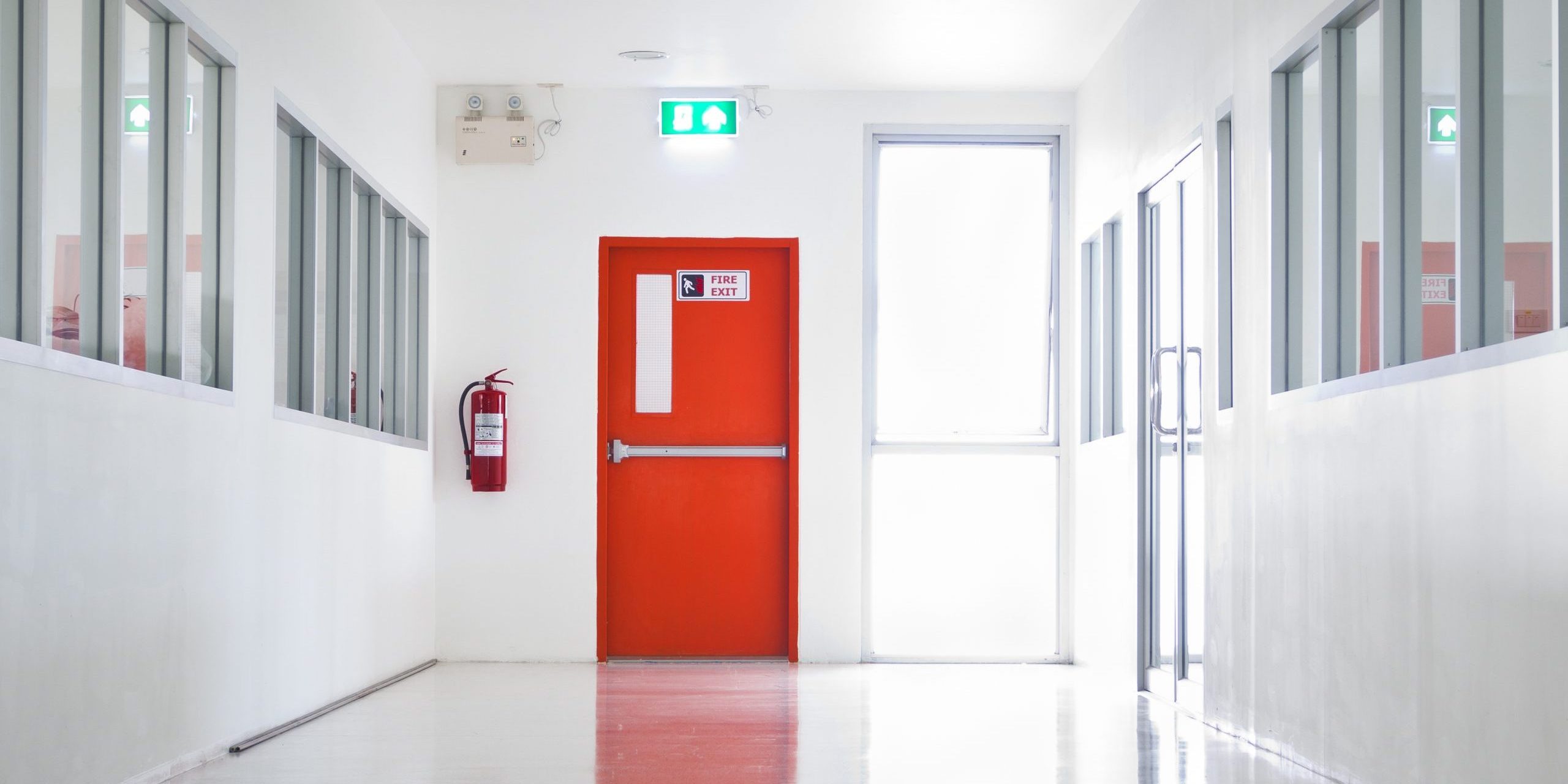 Building,Emergency,Exit,With,Exit,Sign,And,Fire,Extinguisher Fire Safety Requirements